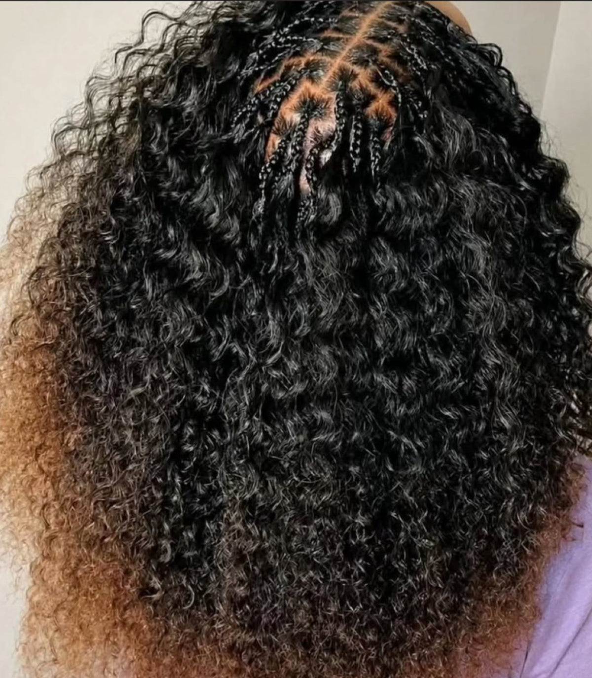 curly ombre pick and drop from the top view . she used crown royale hair braiding bundles