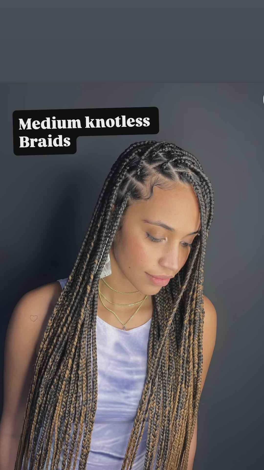 knotless braids in black and blonde colour. waist length