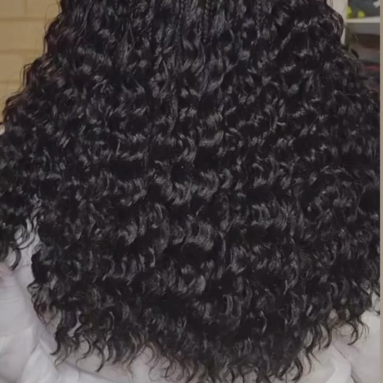 lady showing off her curly pick and drop from the back. She used crown royale hair braiding bundles in deep wave