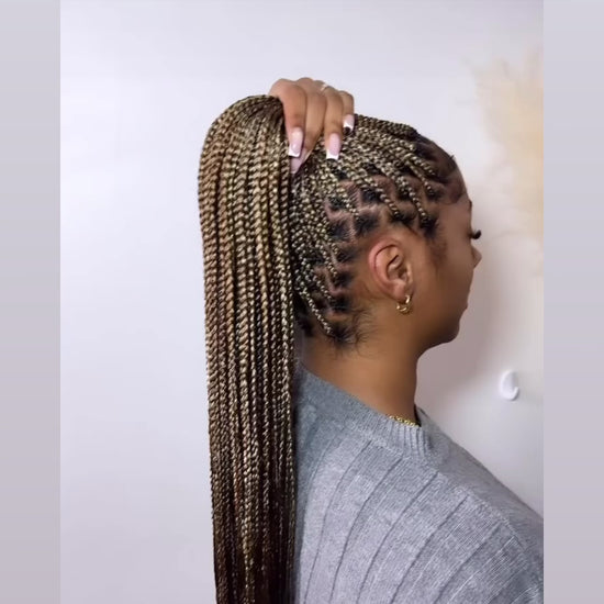 waist length small medium sized in knotless braids 