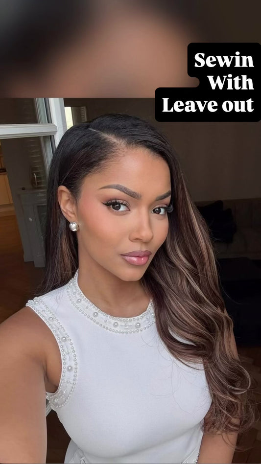 woman in a white top with a sew in with a side parting and a natural  leave out
